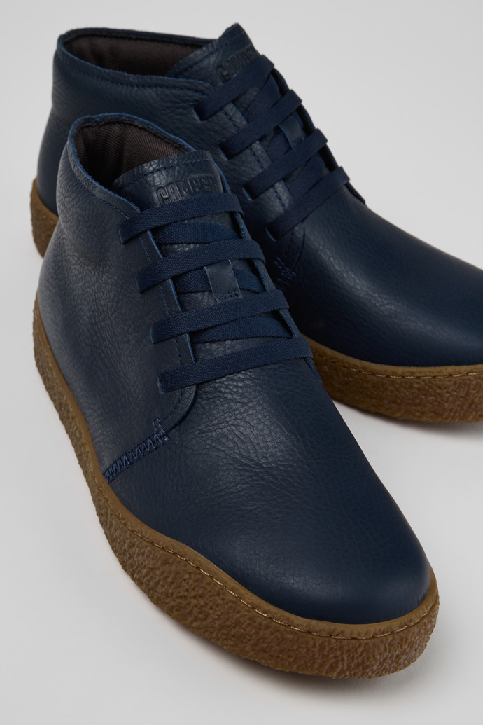 Close-up view of Peu Terreno Blue Leather Ankle Boots for Men.