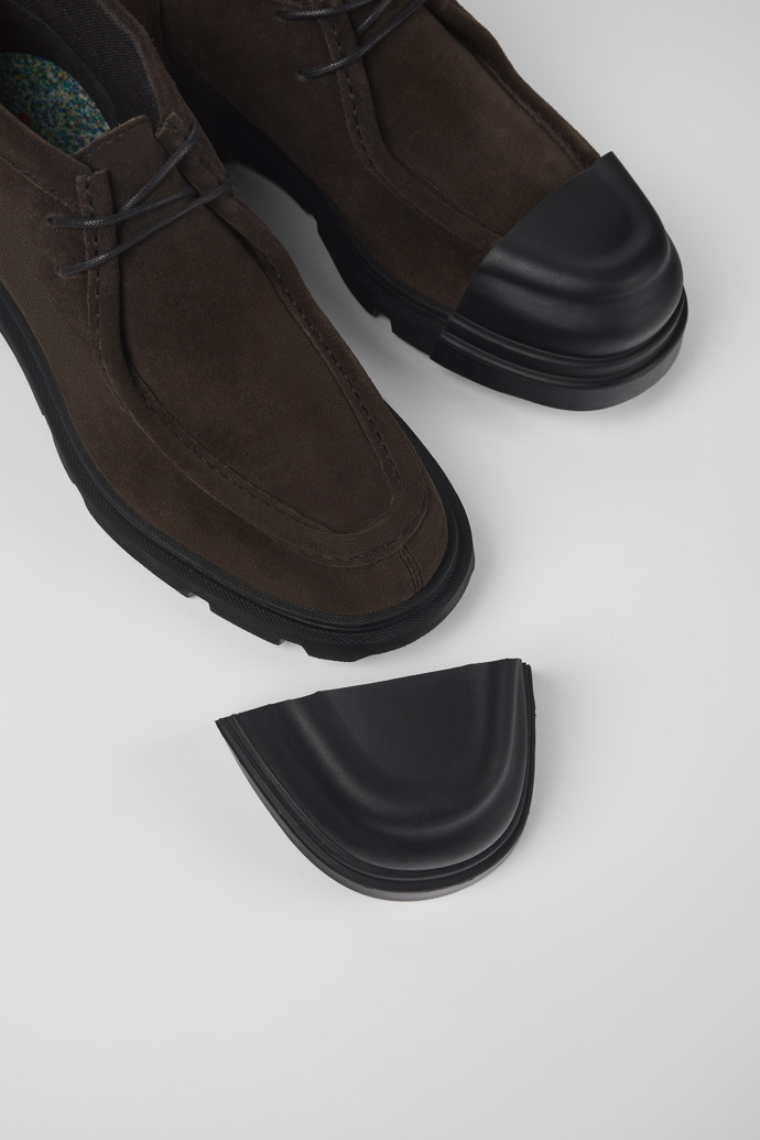 A model wearing Junction Gray nubuck shoes for men
