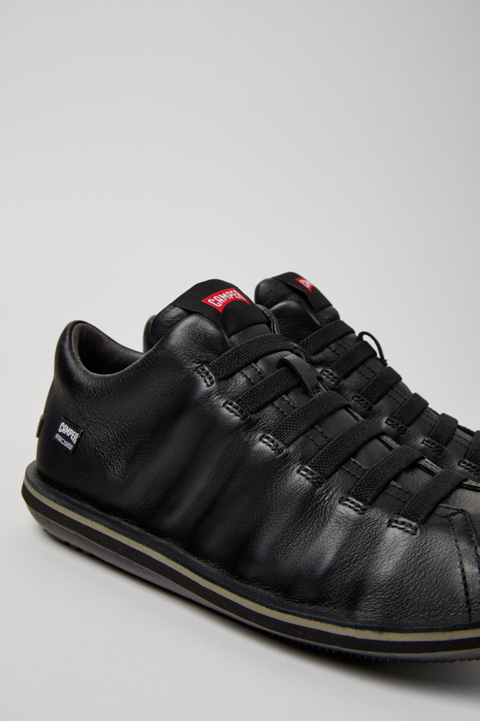 Close-up view of Beetle - HYDROSHIELD Black Leather Ankle Boots for Men.