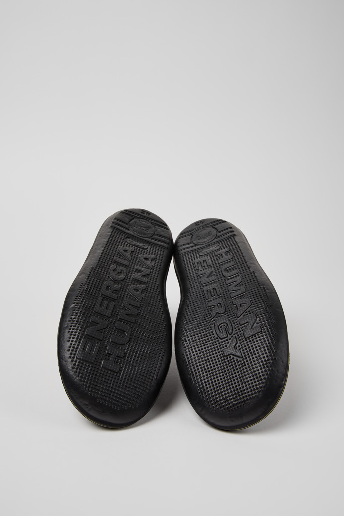 The soles of Beetle - HYDROSHIELD Black Leather Ankle Boots for Men.