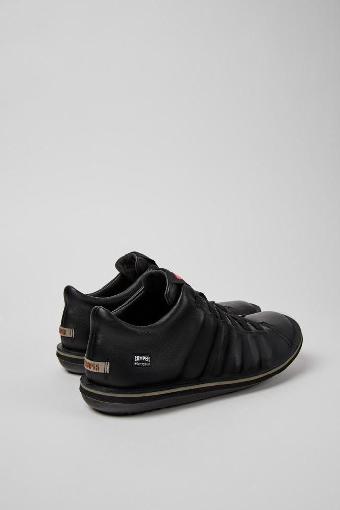 Back view of Beetle - HYDROSHIELD Black Leather Ankle Boots for Men.