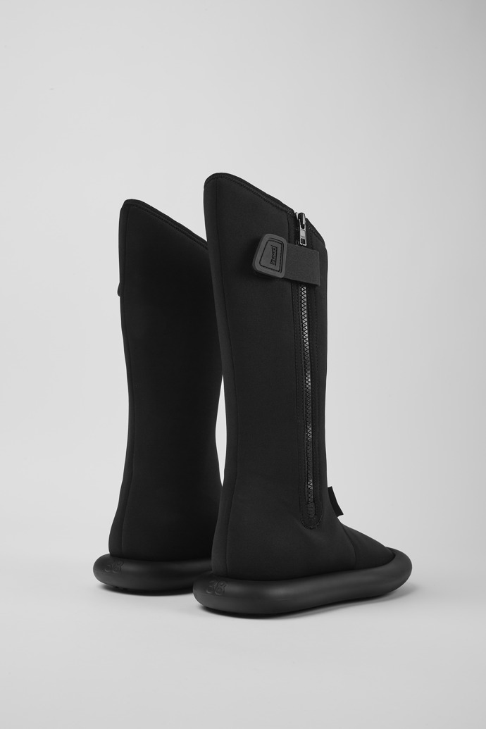 Back view of Ottolinger Black boots for men by Camper x Ottolinger