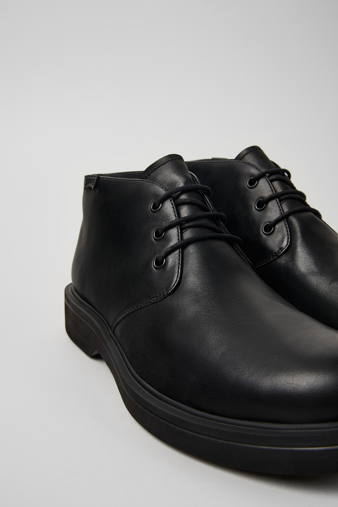 Close-up view of Norman Black leather ankle boots for men