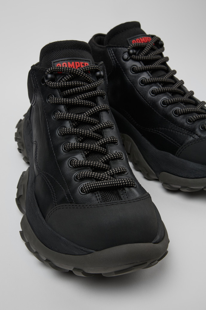 Close-up view of Karst Trek Black ankle boots for men