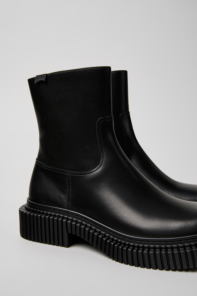 Close-up view of Pix Berlin Black Leather Mid Boots for Men.