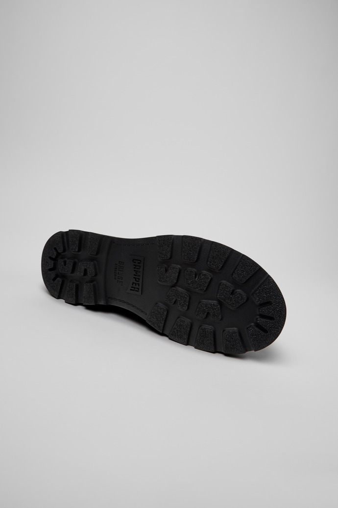 The soles of Brutus+ Gray Leather Ankle Boots for Men.