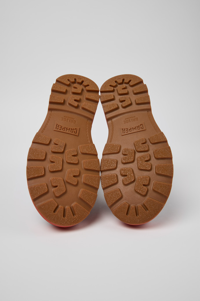 The soles of Brutus+ Brown Leather Ankle Boots for Men.