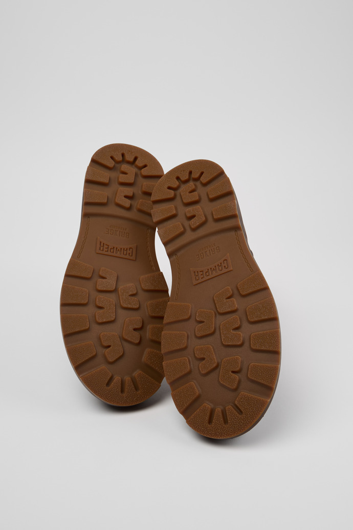 The soles of Brutus+ Brown Nubuck Ankle Boots for Men.