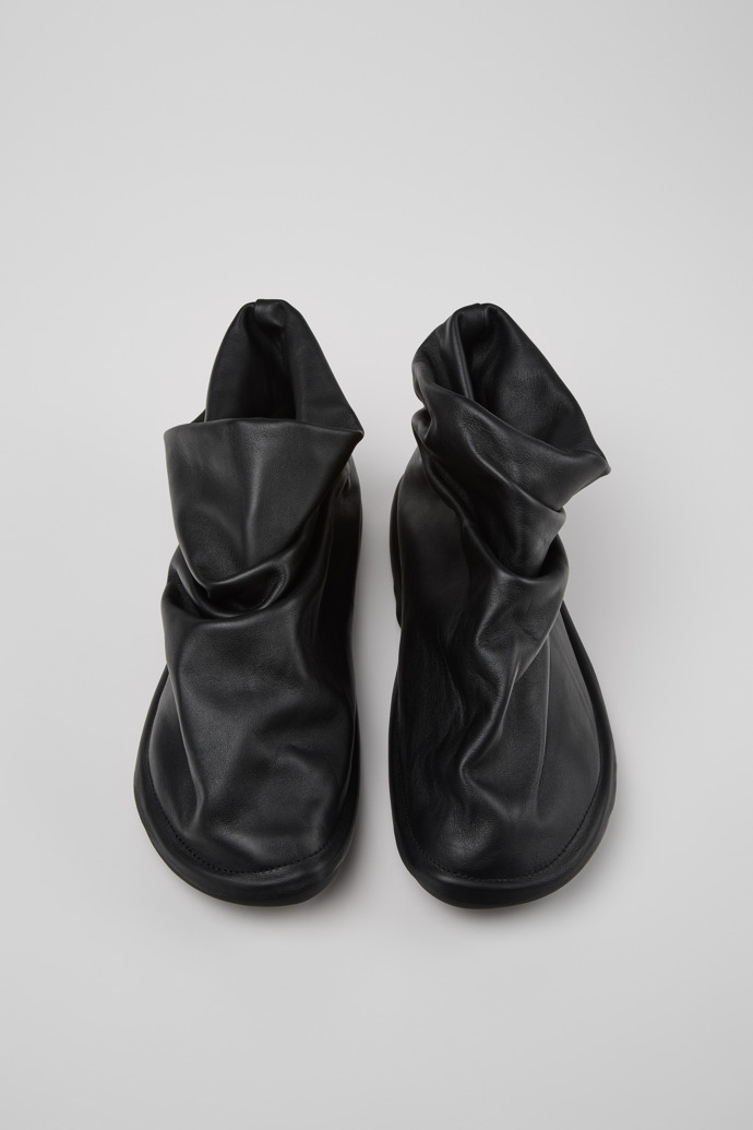 Overhead view of Camper x ISSEY MIYAKE - Peu Form Black Leather Ankle Boots for Men.