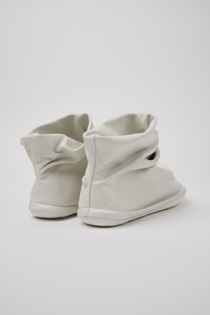 Back view of Camper x ISSEY MIYAKE - Peu Form White Leather Ankle Boots for Men.