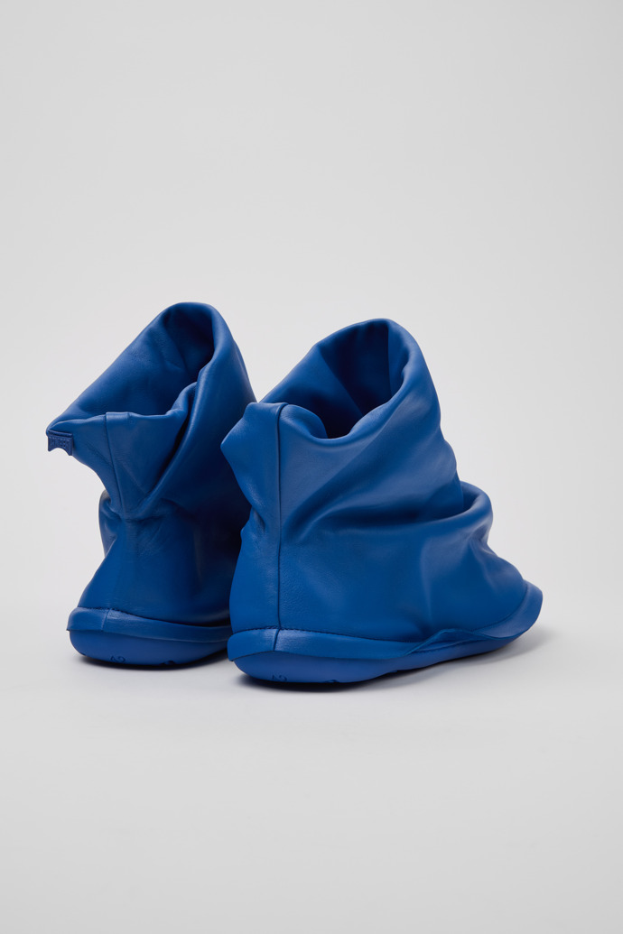 Back view of Camper x ISSEY MIYAKE - Peu Form Blue Leather Ankle Boots for Men.