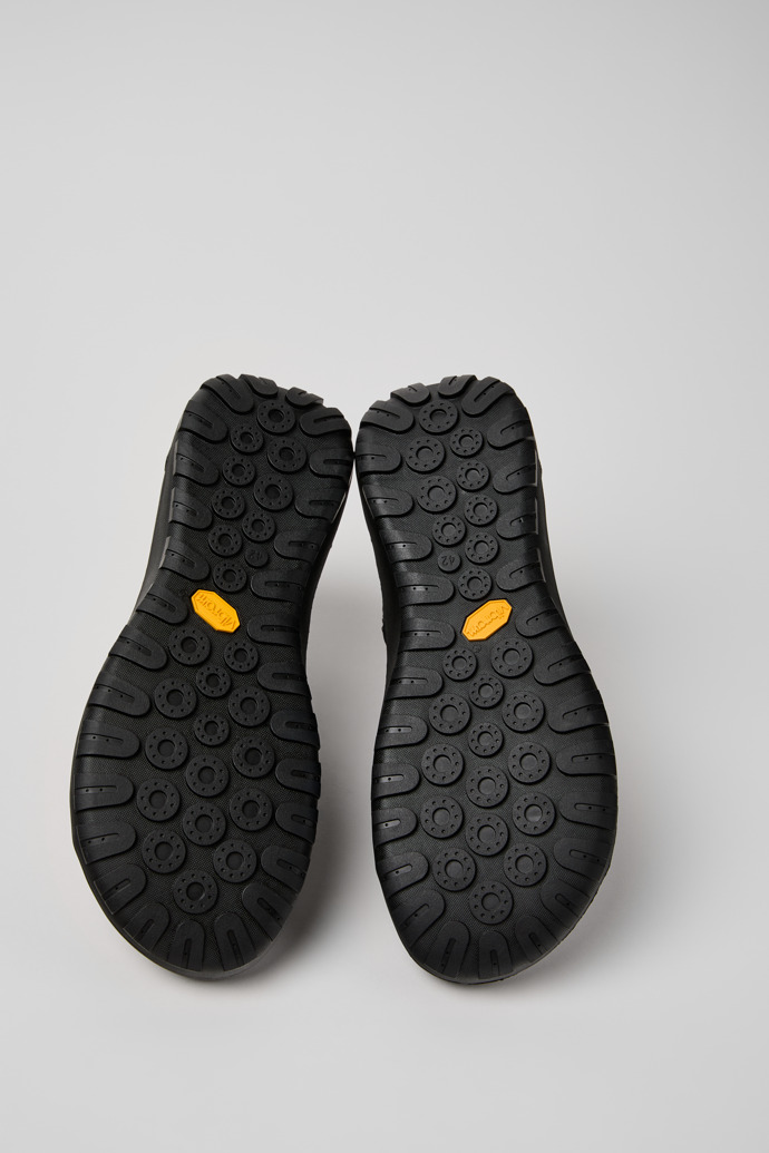 The soles of Peu Serra Black Regenerative Leather and Textile Ankle Boots for Men.