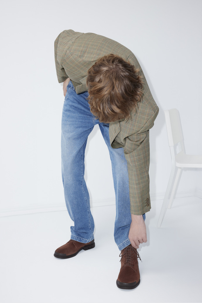 A model wearing Pix Brown Suede Leather Ankle Boots for Men.