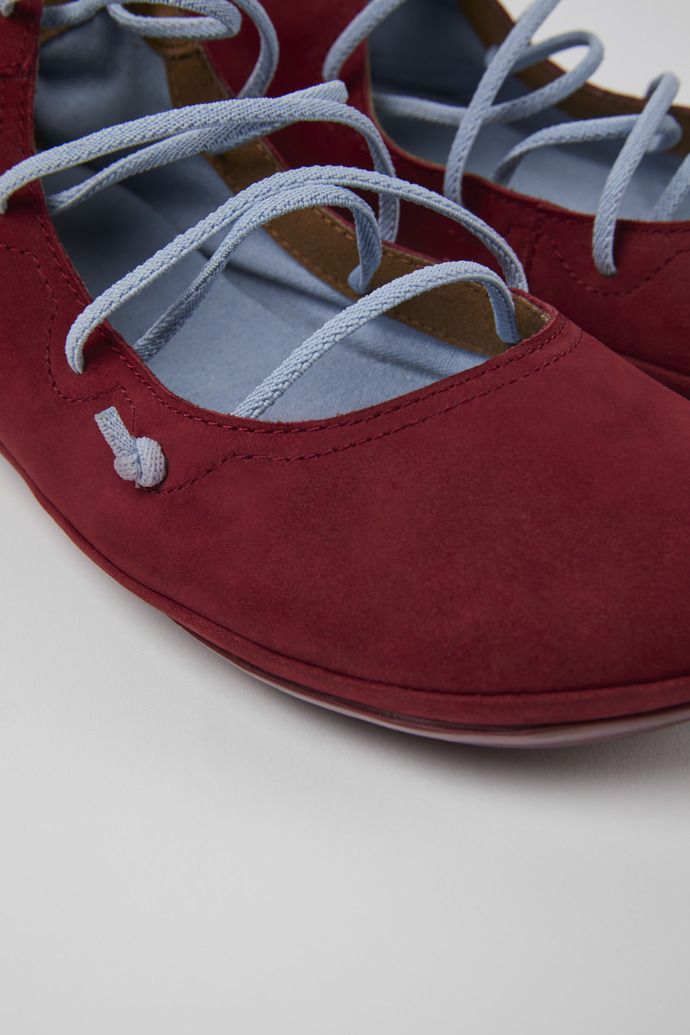 Close-up view of Right Burgundy and blue nubuck shoes for women