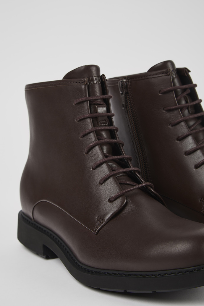 Close-up view of Neuman Brown leather ankle boots for women