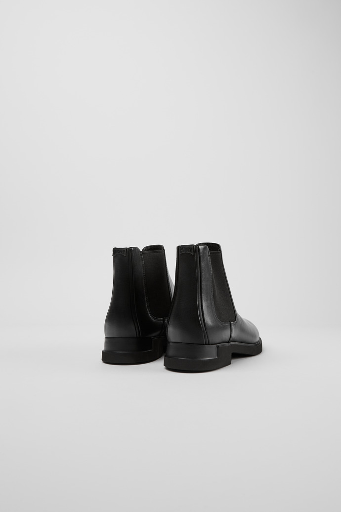 Back view of Iman Black leather chelsea boots for women