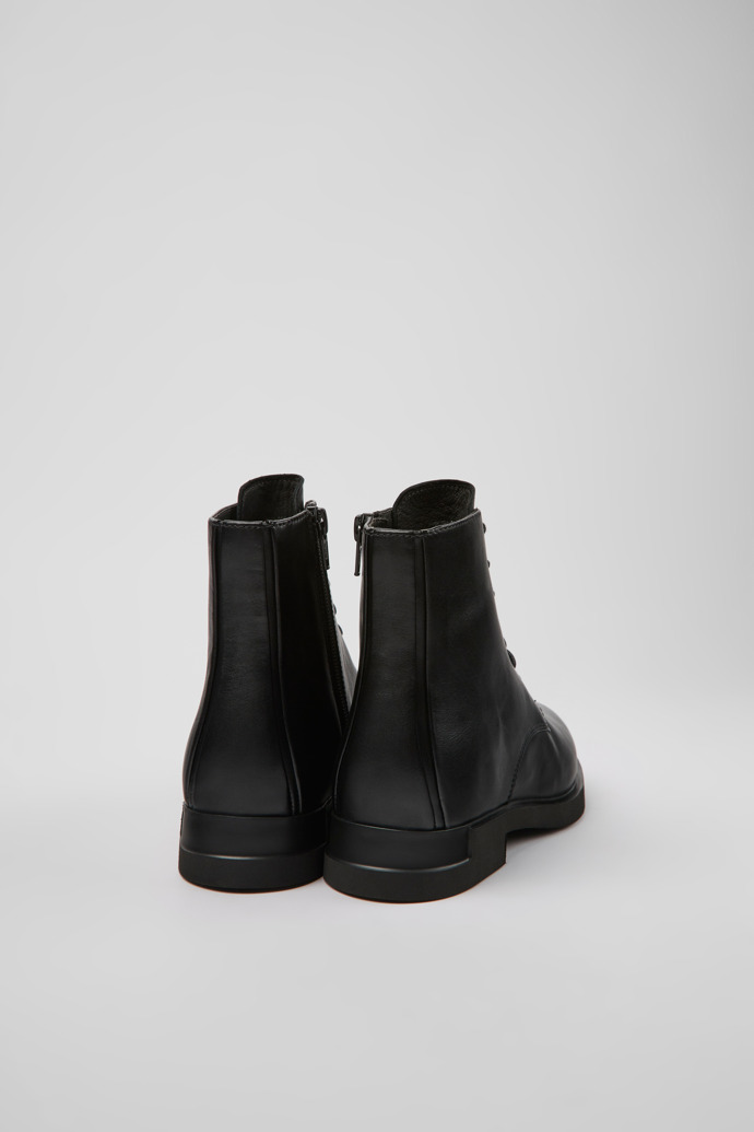 Back view of Iman Black leather lace-up boots for women