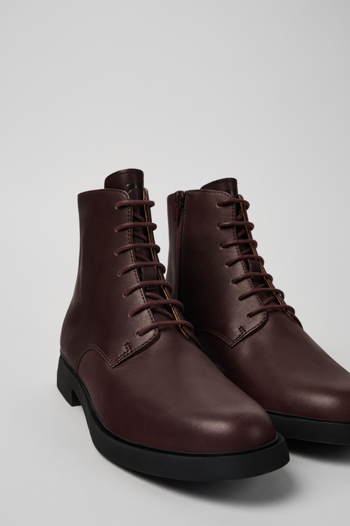 Close-up view of Iman Burgundy leather lace-up boots for women