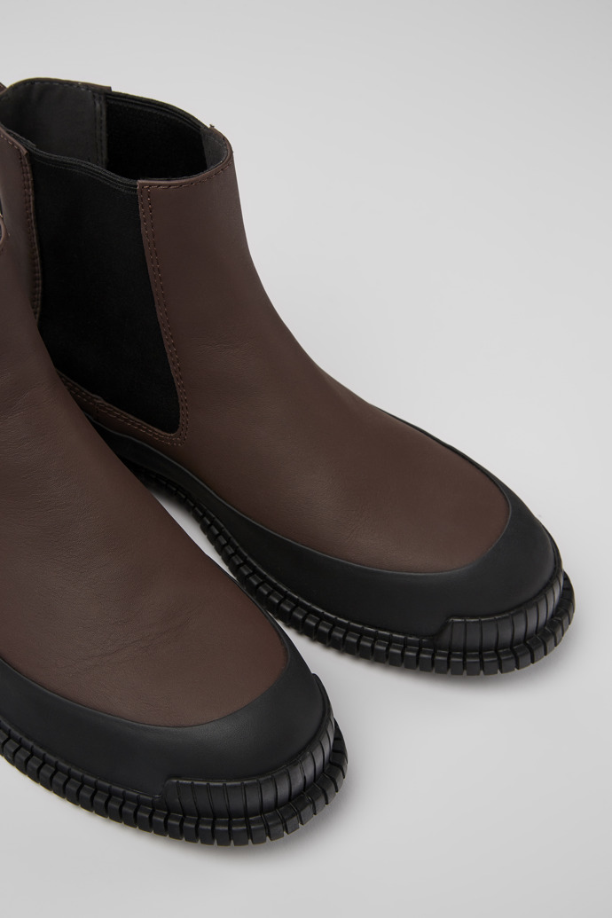Close-up view of Pix Brown and black leather Chelsea boots for women