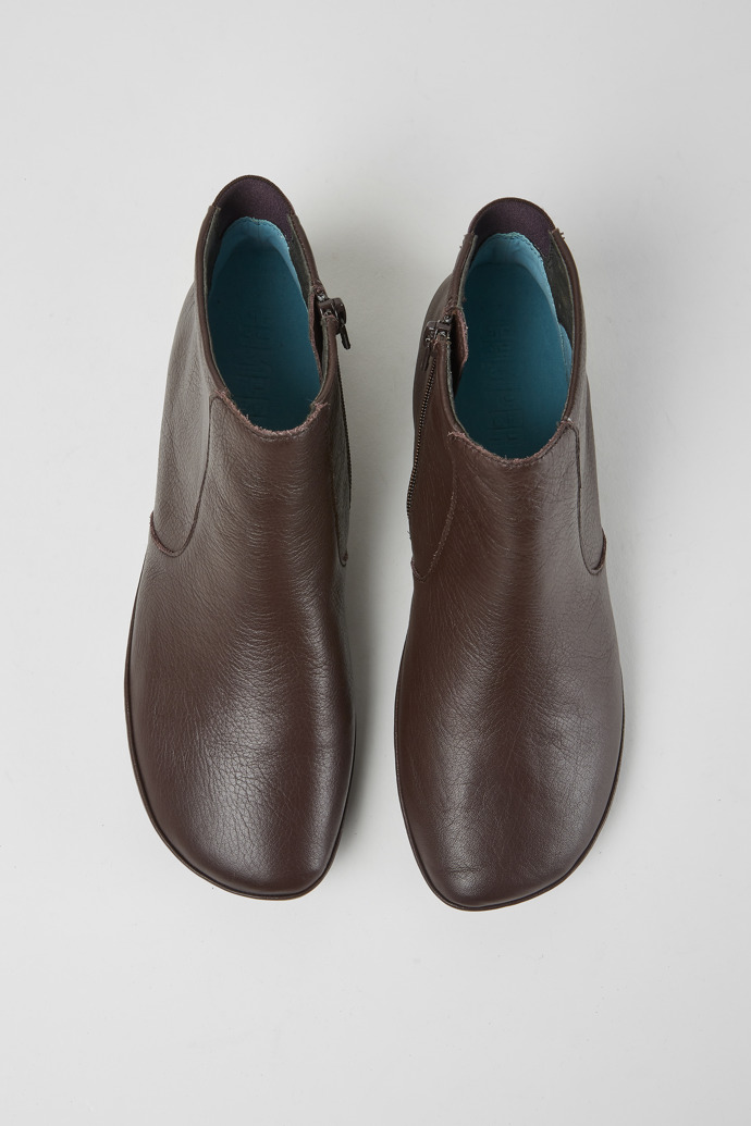 Overhead view of Right Dark brown leather ankle boots