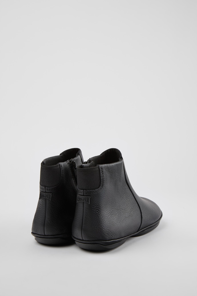 Back view of Right Black leather ankle boots for women