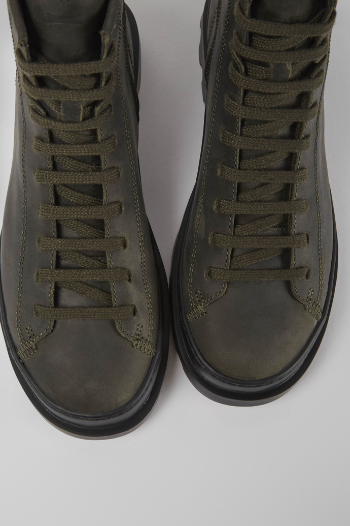 Close-up view of Brutus Dark green waxed nubuck lace-up boots