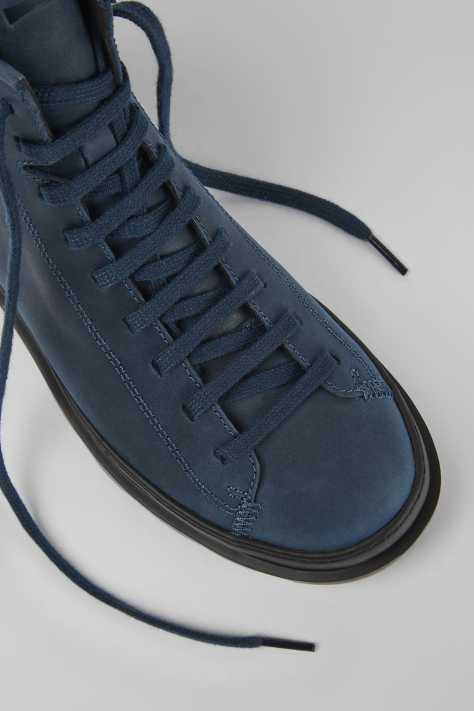 Close-up view of Brutus Blue waxed nubuck lace-up boots