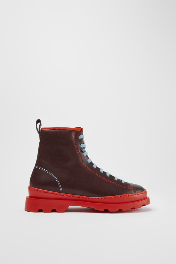 Side view of Twins Red, brown and black boots for women