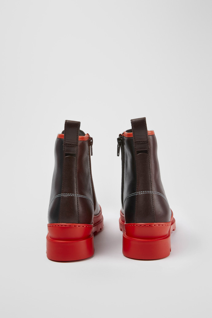 Back view of Twins Red, brown and black boots for women