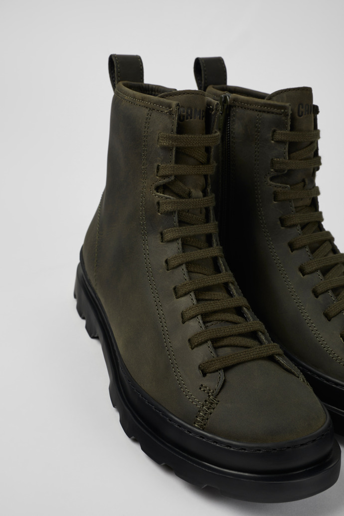 Close-up view of Brutus Green lace-up boots for women