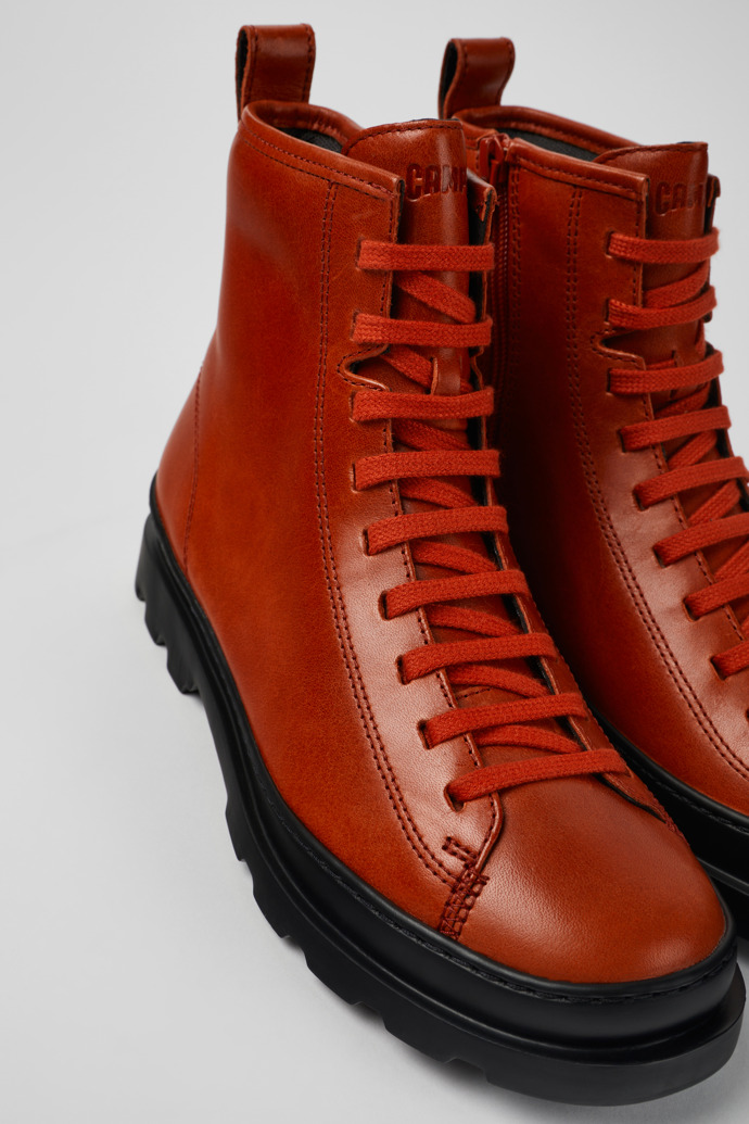 Close-up view of Brutus Red leather lace-up boots for women