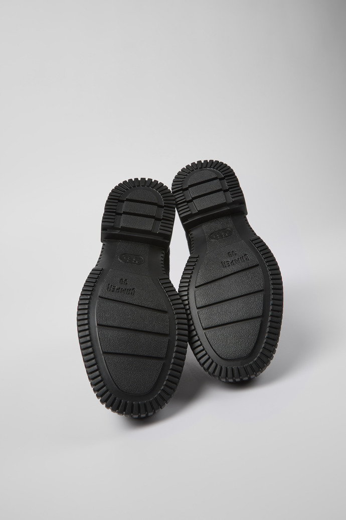 The soles of Pix Black Textile Zip Bootie for Women