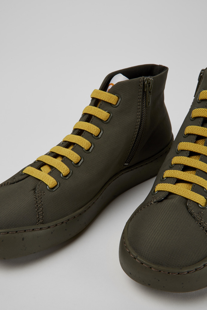 Close-up view of Peu Touring Green textile ankle boots