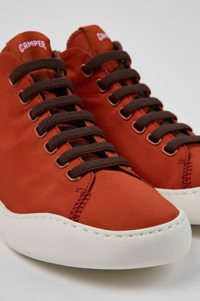 Close-up view of Peu Touring Red recycled PET sneakers for women