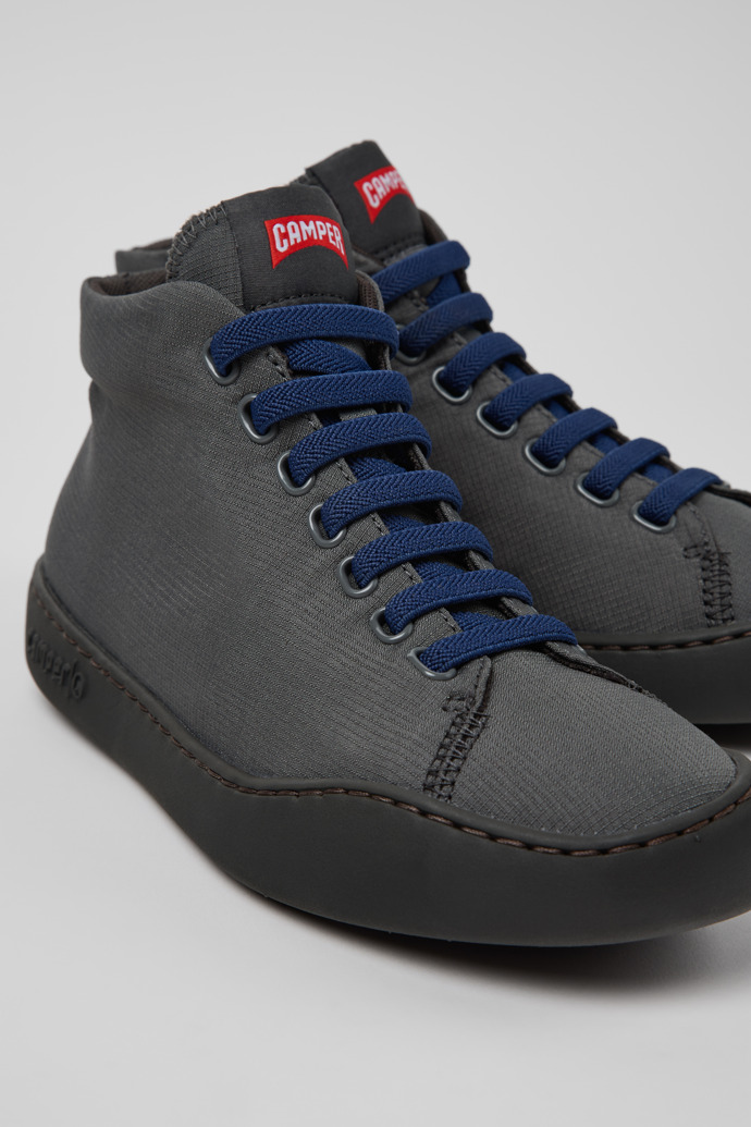 Close-up view of Peu Touring Gray Textile Sneaker Booties for Women.