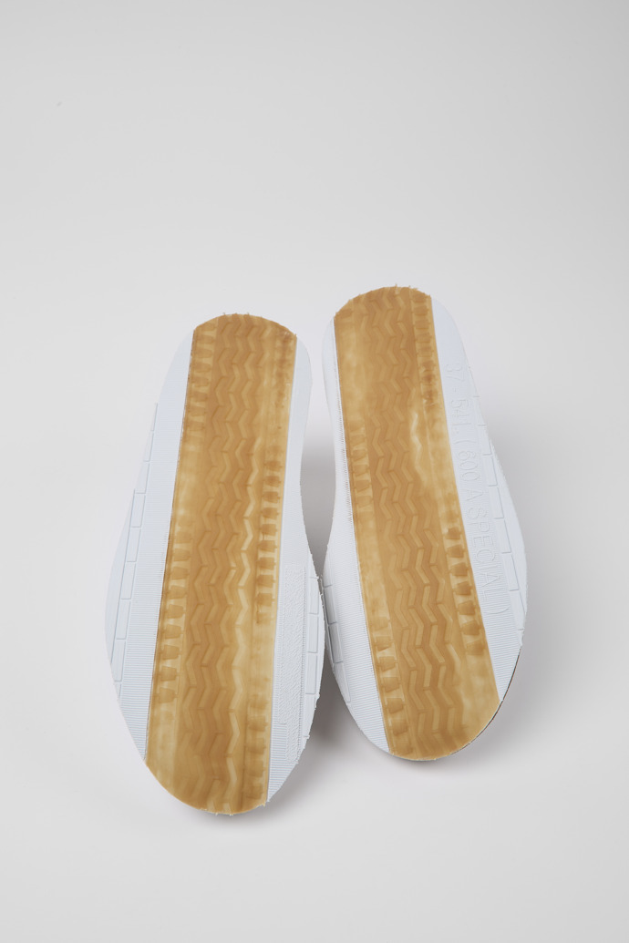 The soles of ReCrafted White leather sneakers for women
