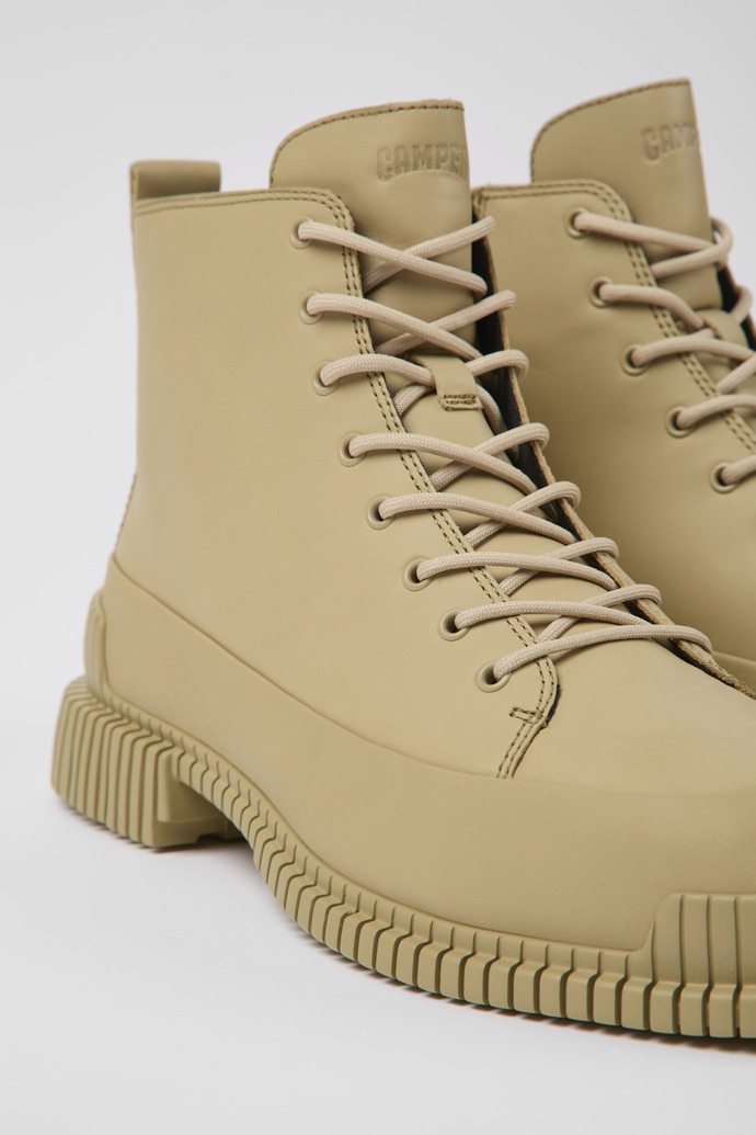 Close-up view of Pix Beige leather ankle boots for women
