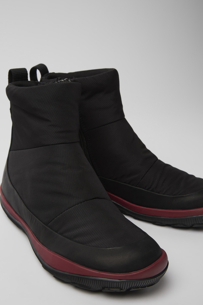 Close-up view of Peu Pista Black recycled PET and leather boots for women