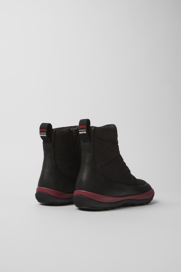 Back view of Peu Pista Black recycled PET and leather boots for women