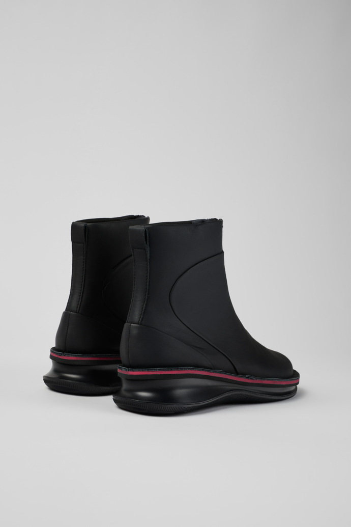 Back view of Rolling Black Boots for Women