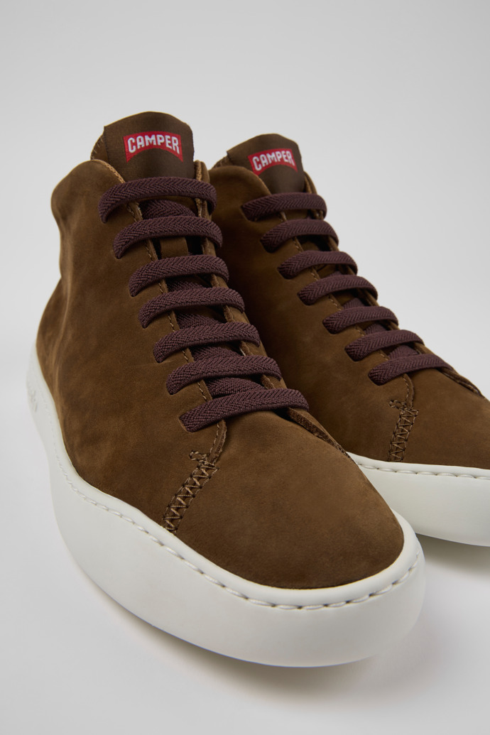 Close-up view of Peu Touring Brown nubuck sneakers for women