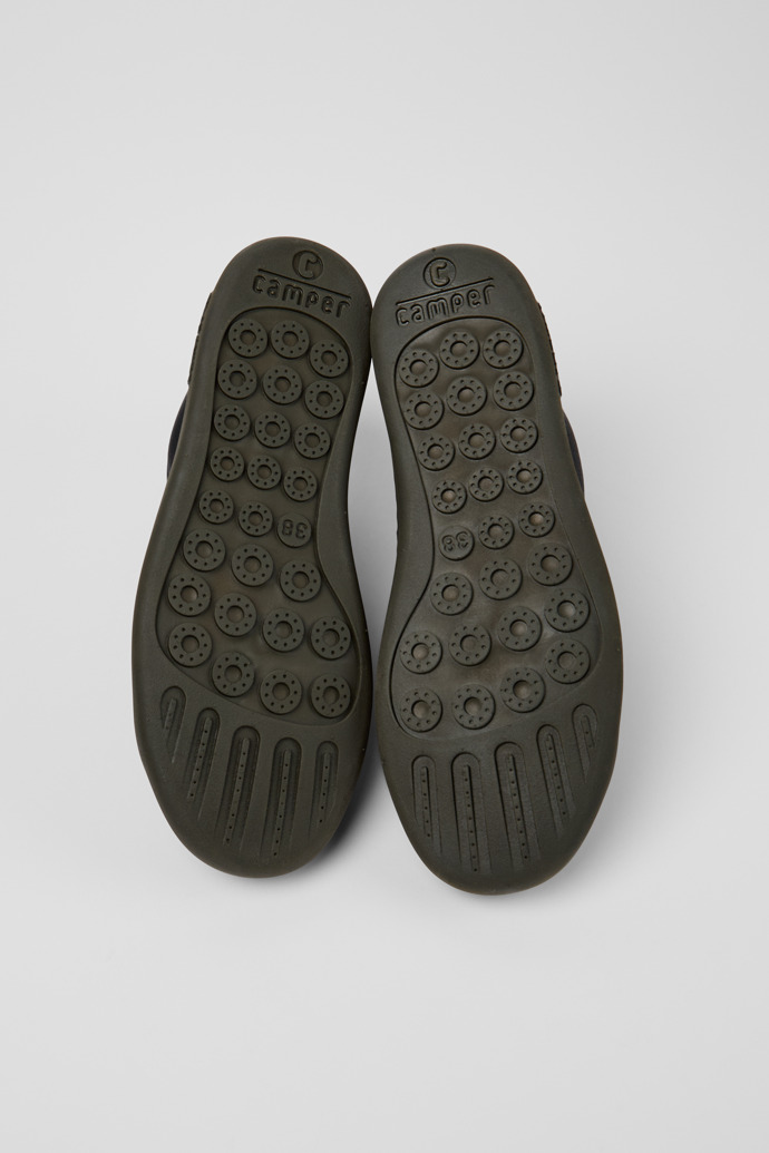 The soles of Peu Touring Black Leather Sneaker Booties for Women.