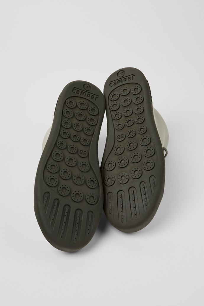 The soles of Peu Touring Gray Leather Sneaker Booties for Women.