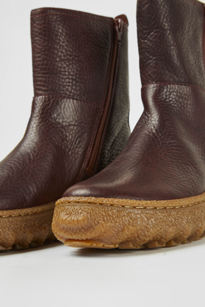 Close-up view of Ground Burgundy leather boots for women