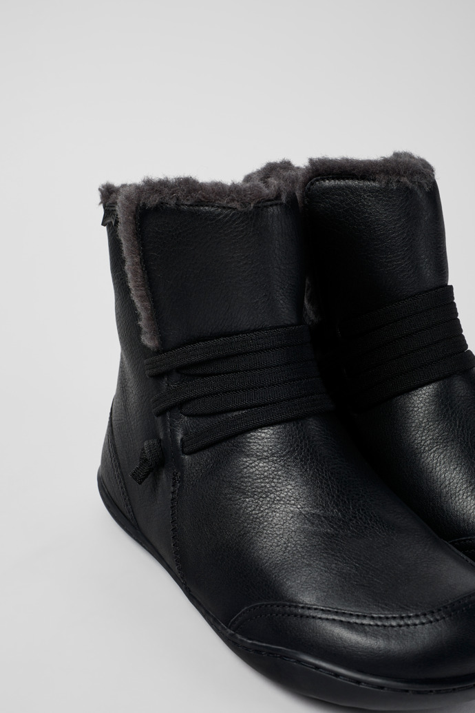 Close-up view of Peu Black leather ankle boots for women
