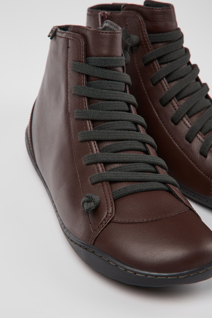 Close-up view of Peu Burgundy leather ankle boots for women