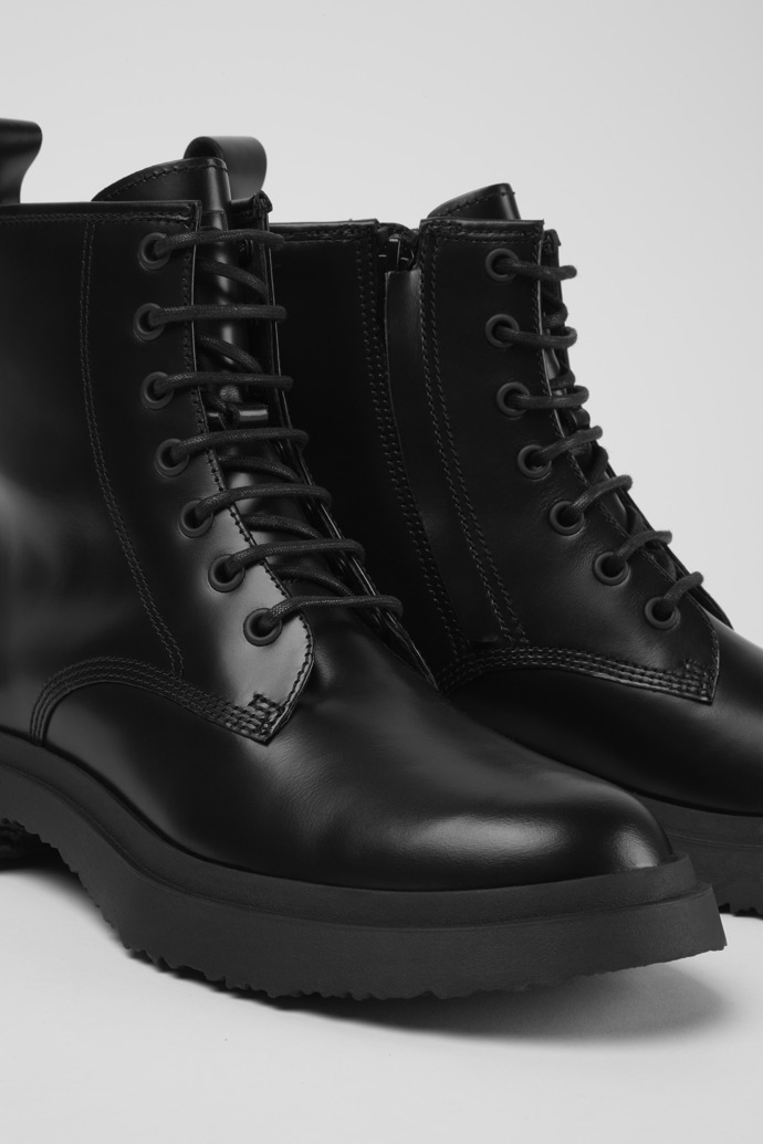 Close-up view of Walden Black leather lace-up boots for women
