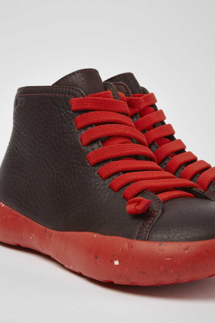 Close-up view of Peu Stadium Burgundy leather ankle boots for women