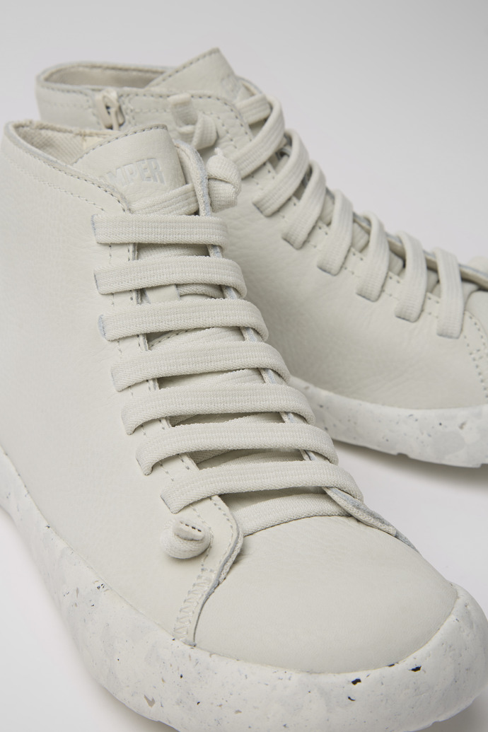 Close-up view of Peu Stadium White non-dyed leather sneakers for women