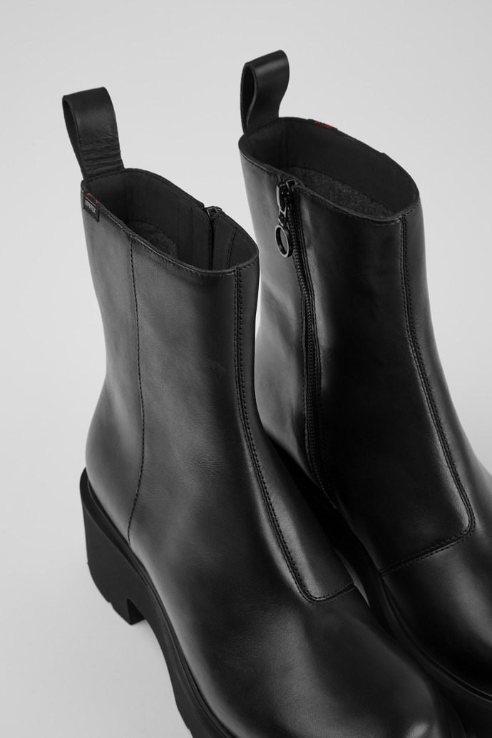 Close-up view of Milah Black leather zip boots for women